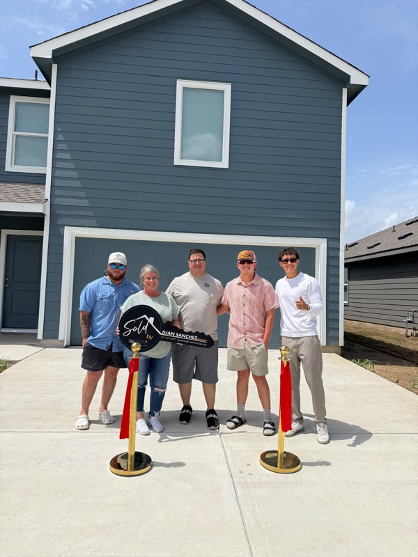 New homeowners receiving their keys at closing